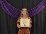 2024 First Place Award Winner, Madeline Roubik, at the Mary Ann Bolton Undergraduate Research Award Ceremony [Photo 1] by University of Northern Iowa. Rod Library.