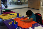 Fall 2016 Clothesline Project Shirt Decorating [Photo 1] by University of Northern Iowa. Women's and Gender Studies.