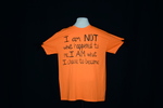 UNI Clothesline Project T-Shirt, 2012-2021 [Orange, Photo 023, Front] by University of Northern Iowa. Rod Library.