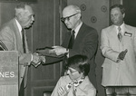 1976 receiving membership into the Iowa Broadcasters Association Hall of Fame