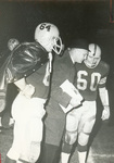 1960s Two players and coach