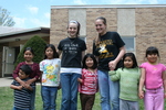 Volunteers with children at St. Bridget's Catholic Church 02 by Julie Berg-Raymond