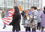 35- Marchers with American flag 01 by Araceli M. Castañeda