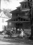 Students in Front of a House Decorated for Homecoming