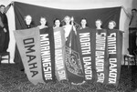 Women Holding College Flags