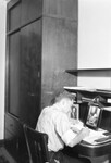 Man at a Desk in Baker Hall