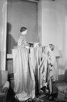 Women Putting Up Curtains