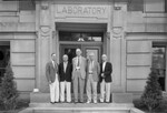 Men in Front of Laboratory Building
