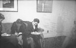 Students Writing on a Couch 01