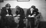 Students Writing on a Couch 03