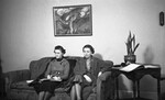 Two Women Sitting on Couch