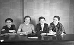 Four Women Sitting at Table 04